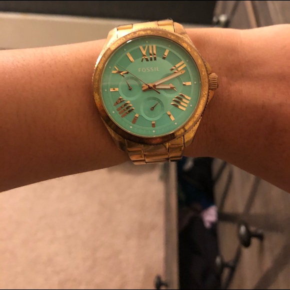 Gold Fossil watch with teal face - Picture 2 of 3